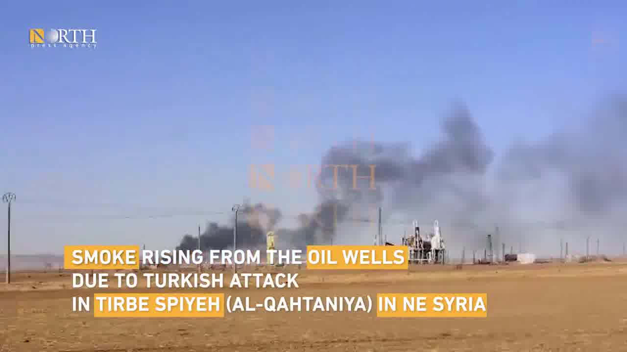 Smoke rising from an oil field in Tirbe Spiyeh (al-Qahtaniya) town in Northeast Syria due to Turkish airstrike.