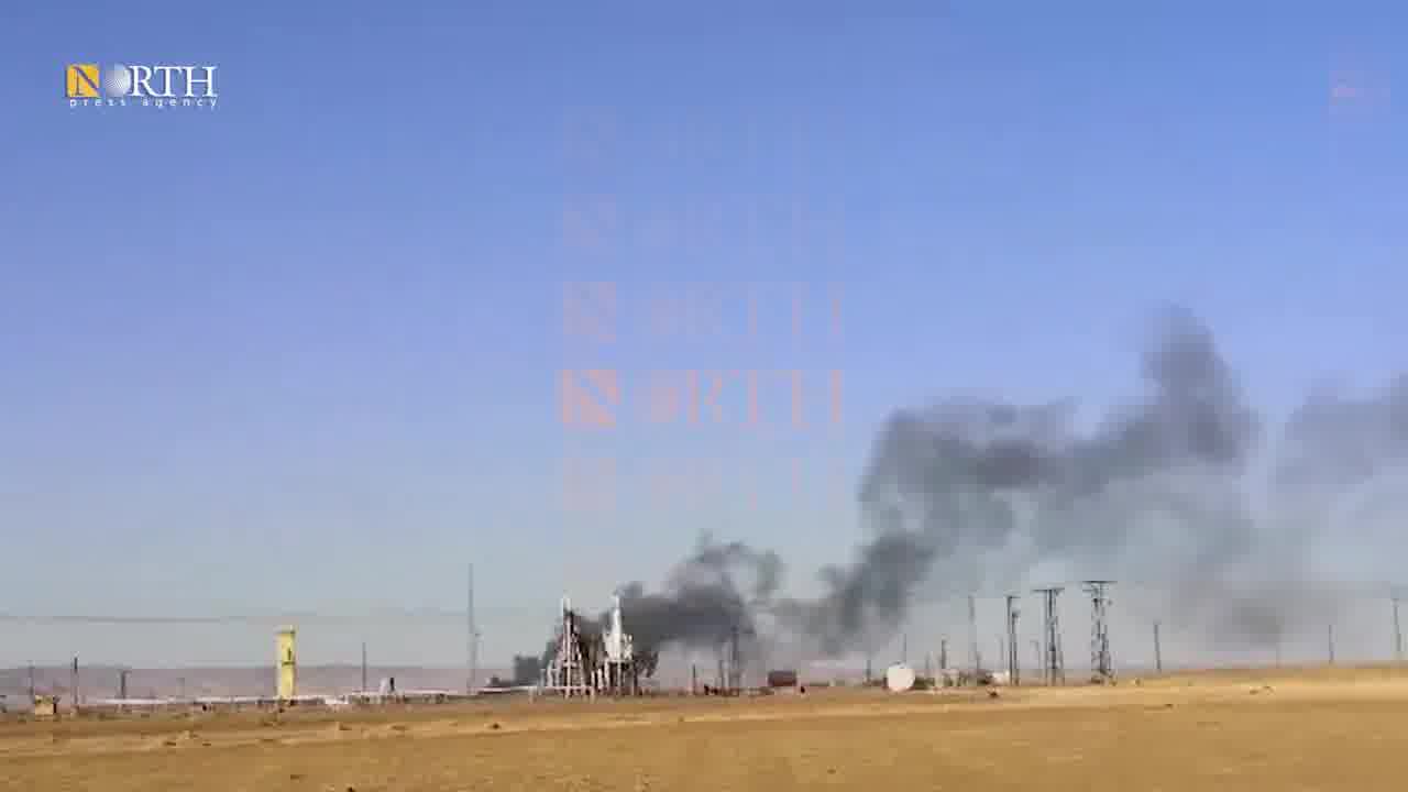 Smoke rising from an oil field in Tirbe Spiyeh (al-Qahtaniya) town in Northeast Syria due to Turkish airstrike.