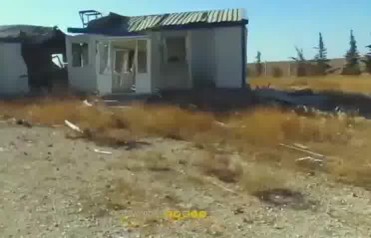 Dün gece Türk yapımı İHA'nın bombalaması sonucu Ayn İsa kentinin batı kırsalında bulunan Kobani sanayi tesisine düzenlenen hava saldırılarından görüntüler