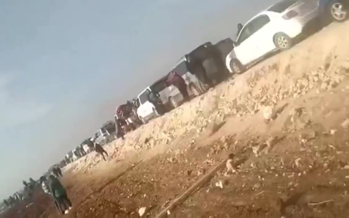 Tel Rifat: Tens of thousands of people are still waiting for a corridor to be opened. They had to spend the night on the street amid freezing temperatures, no water and no food. These are the IDPs from Afrin who settled in Tal Rifaat fleeing from the invasion of Afrin 