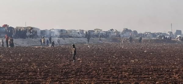 Tel Rifat: Tens of thousands of people are still waiting for a corridor to be opened. They had to spend the night on the street amid freezing temperatures, no water and no food. These are the IDPs from Afrin who settled in Tal Rifaat fleeing from the invasion of Afrin 