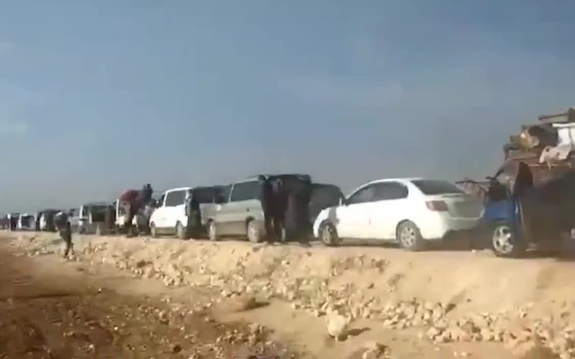 Tel Rifat: Tens of thousands of people are still waiting for a corridor to be opened. They had to spend the night on the street amid freezing temperatures, no water and no food. These are the IDPs from Afrin who settled in Tal Rifaat fleeing from the invasion of Afrin 