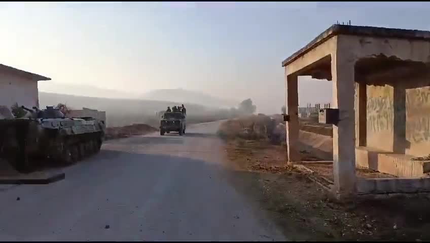 Rebels inside the town of Al-Amqiyah in Saha al-Ghab