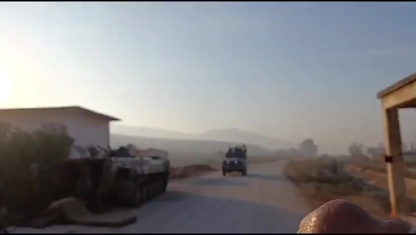 Rebels inside the town of Al-Amqiyah in Saha al-Ghab