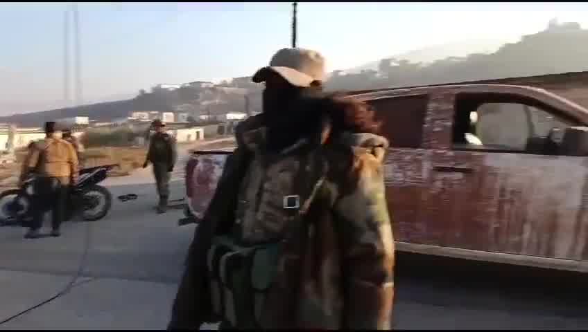 Rebels inside the town of Al-Amqiyah in Saha al-Ghab