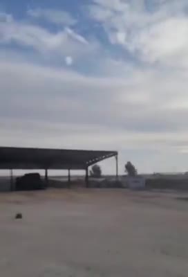 Rebels inside the Al-Majanzarat School, in the vicinity of Hama city