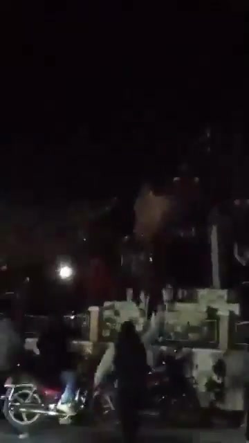 Statue of Hafez al-Assad falling again in the center of Daraa city after the rebels controlled the city