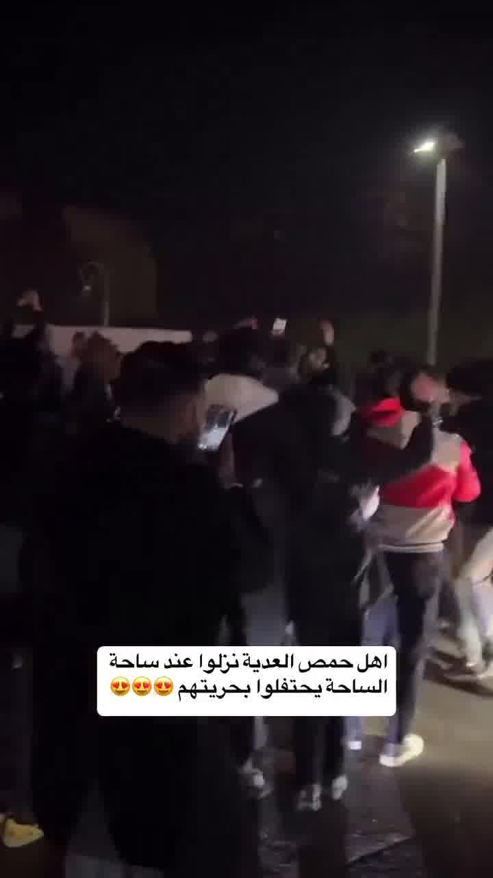 Celebration in the center of Homs, in the Clock Square