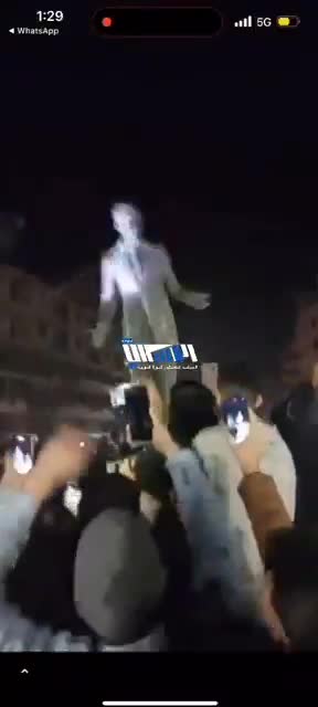 The moment of demolishing the statue of Hafez al-Assad in the heart of Homs city