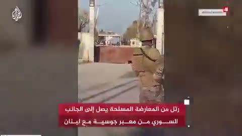 A convoy of armed opposition arrives at the Syrian side of the Jusiyah crossing with Lebanon