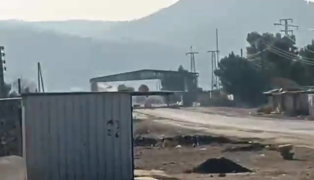 This video captures an SNA convoy attempting to cross the Qaraqozak Bridge but ultimately being repelled, forcing them to abandon their armored vehicle