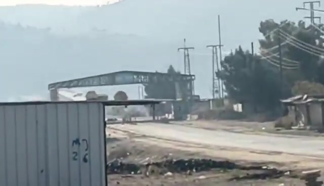 This video captures an SNA convoy attempting to cross the Qaraqozak Bridge but ultimately being repelled, forcing them to abandon their armored vehicle