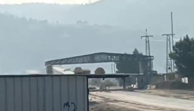 This video captures an SNA convoy attempting to cross the Qaraqozak Bridge but ultimately being repelled, forcing them to abandon their armored vehicle