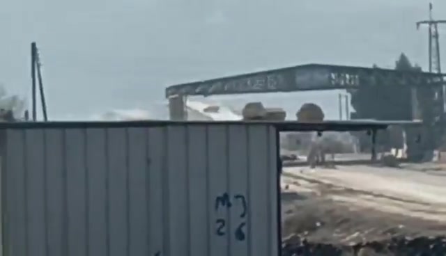 This video captures an SNA convoy attempting to cross the Qaraqozak Bridge but ultimately being repelled, forcing them to abandon their armored vehicle