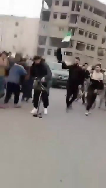 Kurdish sources claim that they are not behind shooting protesters in Raqqa and post this video to demonstrate that someone amongst the protesters is holding a PKC machine gun shooting