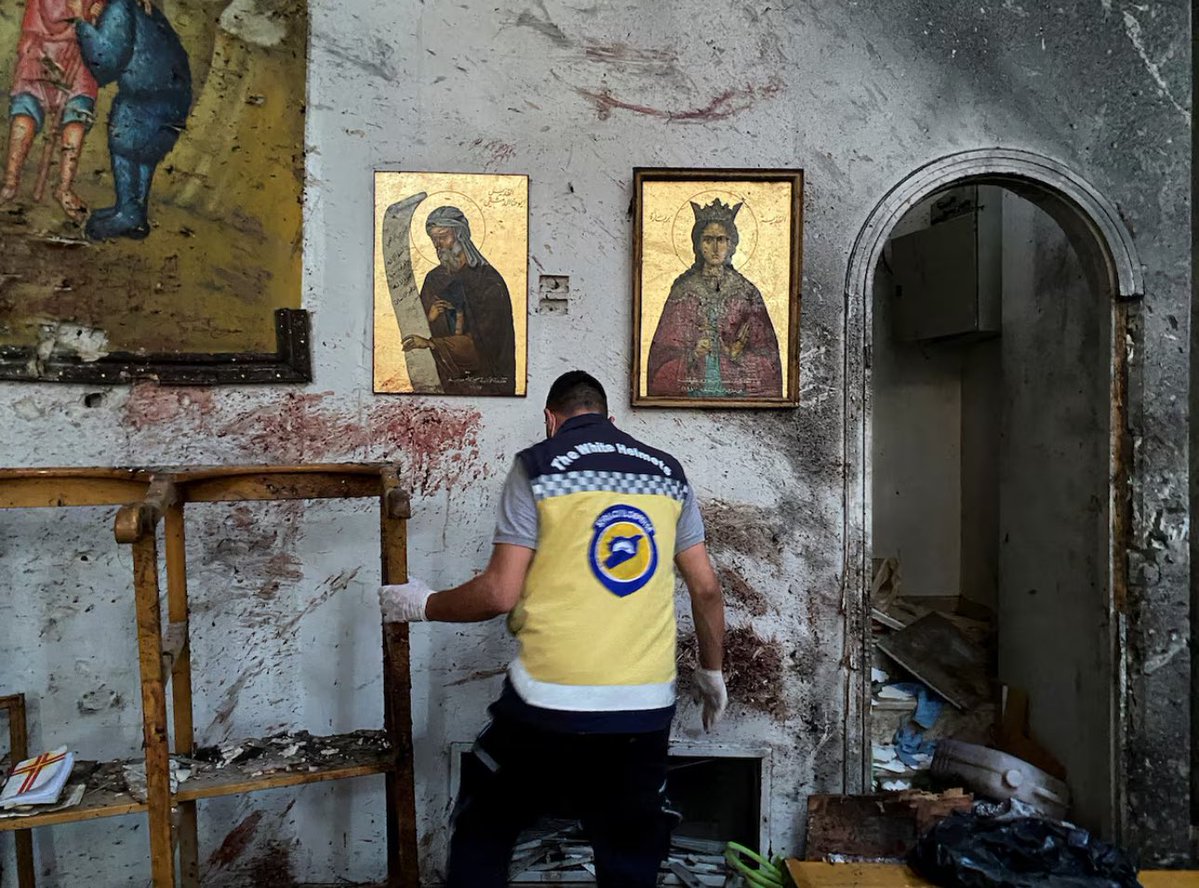 A civil defence member inspects the damage after a blast rocked the Mar Elias Church in Damascus  — Syria June 22, 2025. REUTERS/Firas Makdesi
