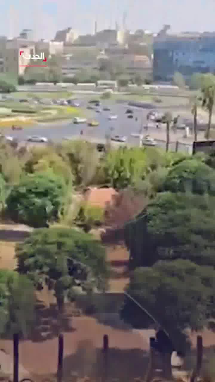Broken glass and debris at the scene at Al Hadath office in Damascus