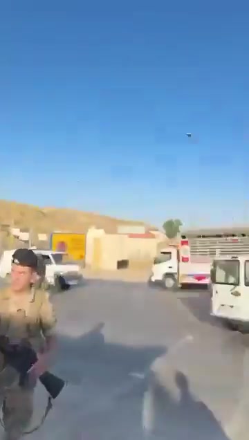 Lebanese army personnel prevent Druze from advancing to the Syrian border.