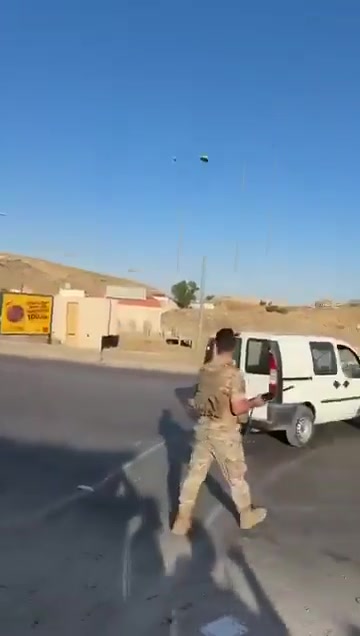 Lebanese army personnel prevent Druze from advancing to the Syrian border.