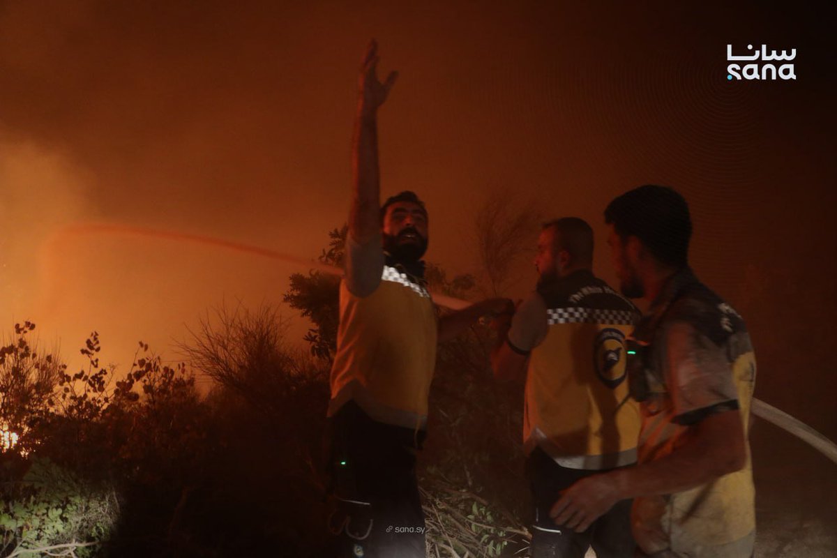 Civil defense teams continue their efforts to extinguish a fire that broke out in Jabal al-Turkman in the Latakia countryside.