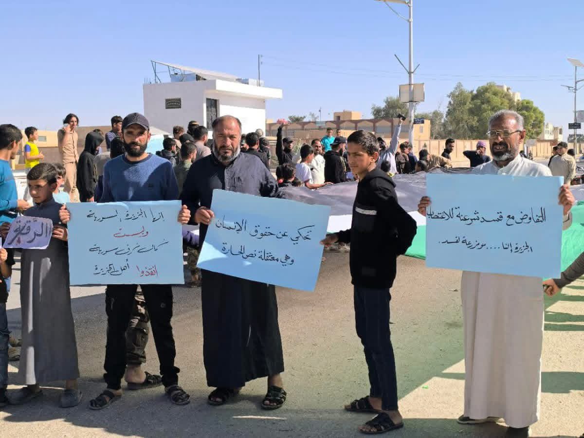 Photos from the protest in the town of Maadan in the eastern Raqqa countryside against the violations committed by the SDF militias in the Syrian Jazeera region