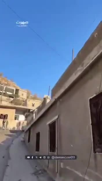 Damage caused by the bombing of the Syrian town of Beit Jinn, including damage to a mosque's minaret.