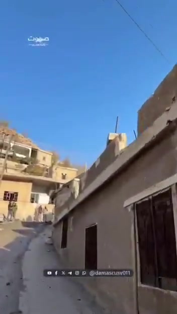 Damage caused by the bombing of the Syrian town of Beit Jinn, including damage to a mosque's minaret.