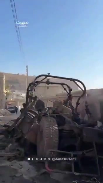 Damage caused by the bombing of the Syrian town of Beit Jinn, including damage to a mosque's minaret.