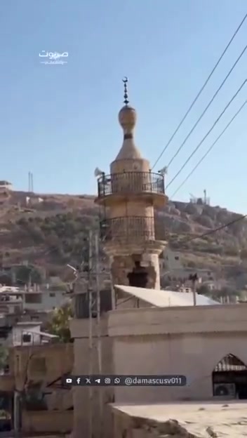 Damage caused by the bombing of the Syrian town of Beit Jinn, including damage to a mosque's minaret.