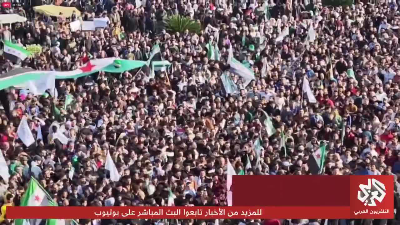 Scenes from Homs: Thousands of Syrians demonstrate on the first anniversary of Operation Deterring Aggression