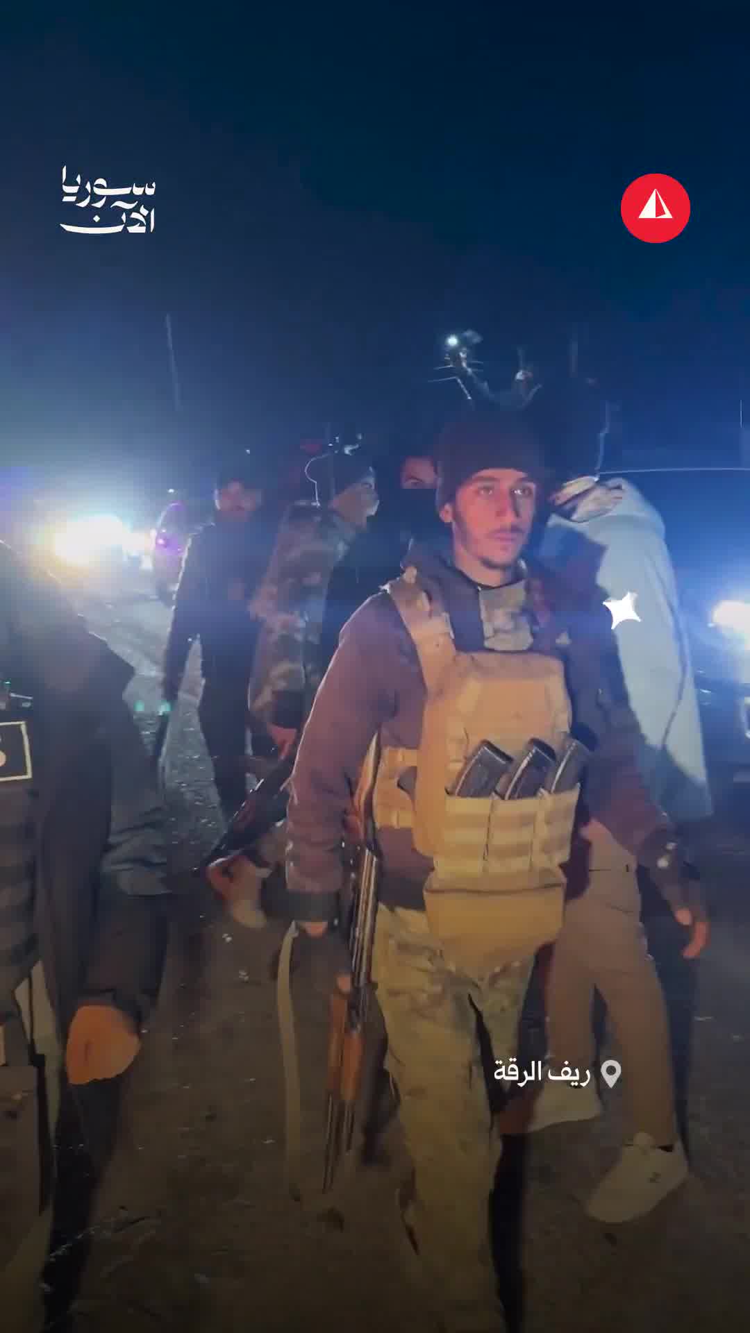 Internal security forces enter the town of Zur Shamar in the southern Raqqa countryside amid a warm welcome from the residents