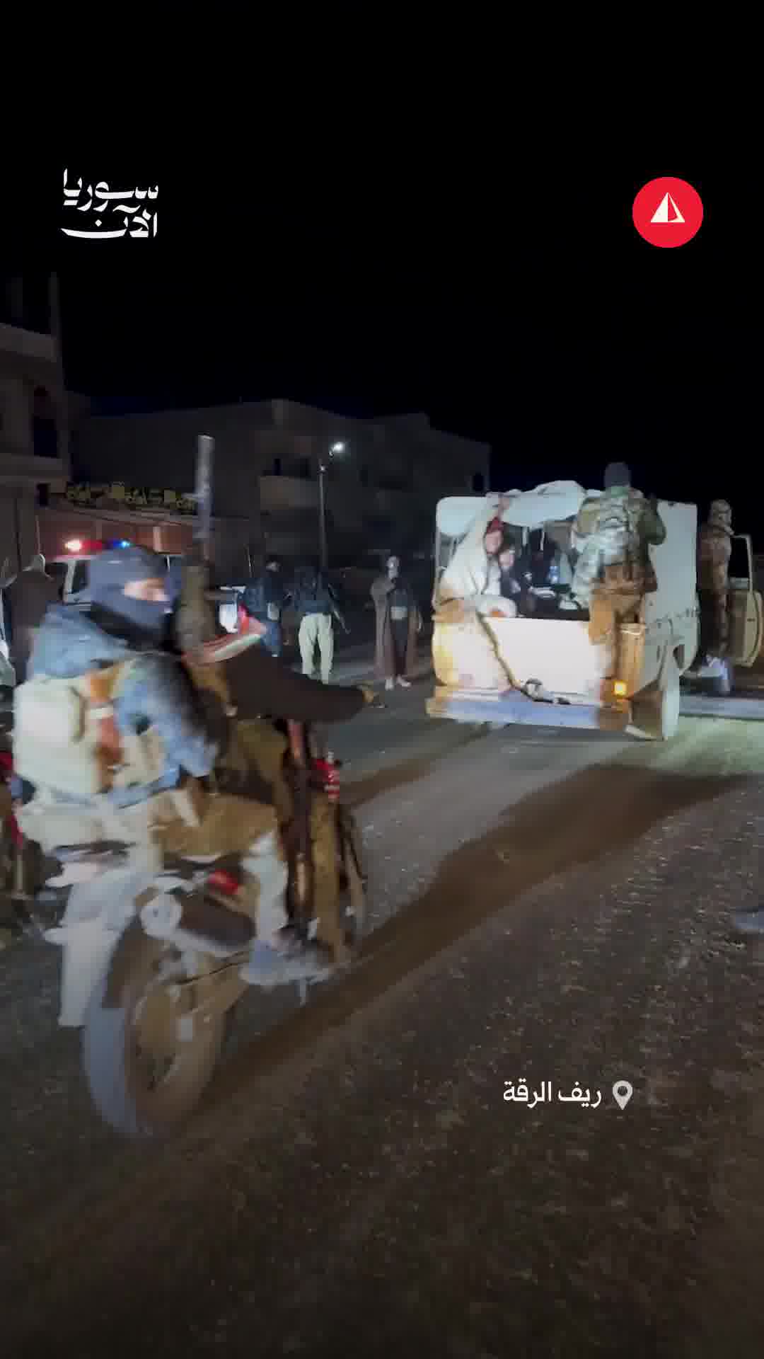 Internal security forces enter the town of Zur Shamar in the southern Raqqa countryside amid a warm welcome from the residents