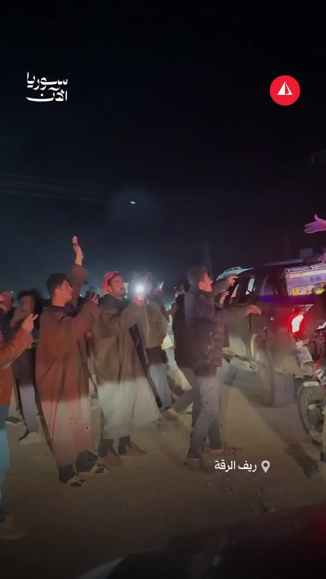 Internal security forces enter the town of Zur Shamar in the southern Raqqa countryside amid a warm welcome from the residents