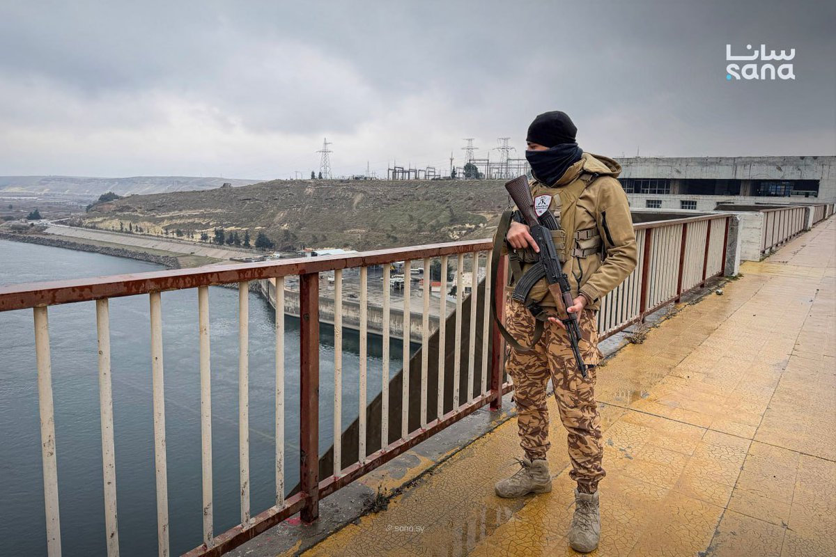 Military police deployed at the Euphrates Dam in the city of Tabqa, west of Raqqa, Syria.
