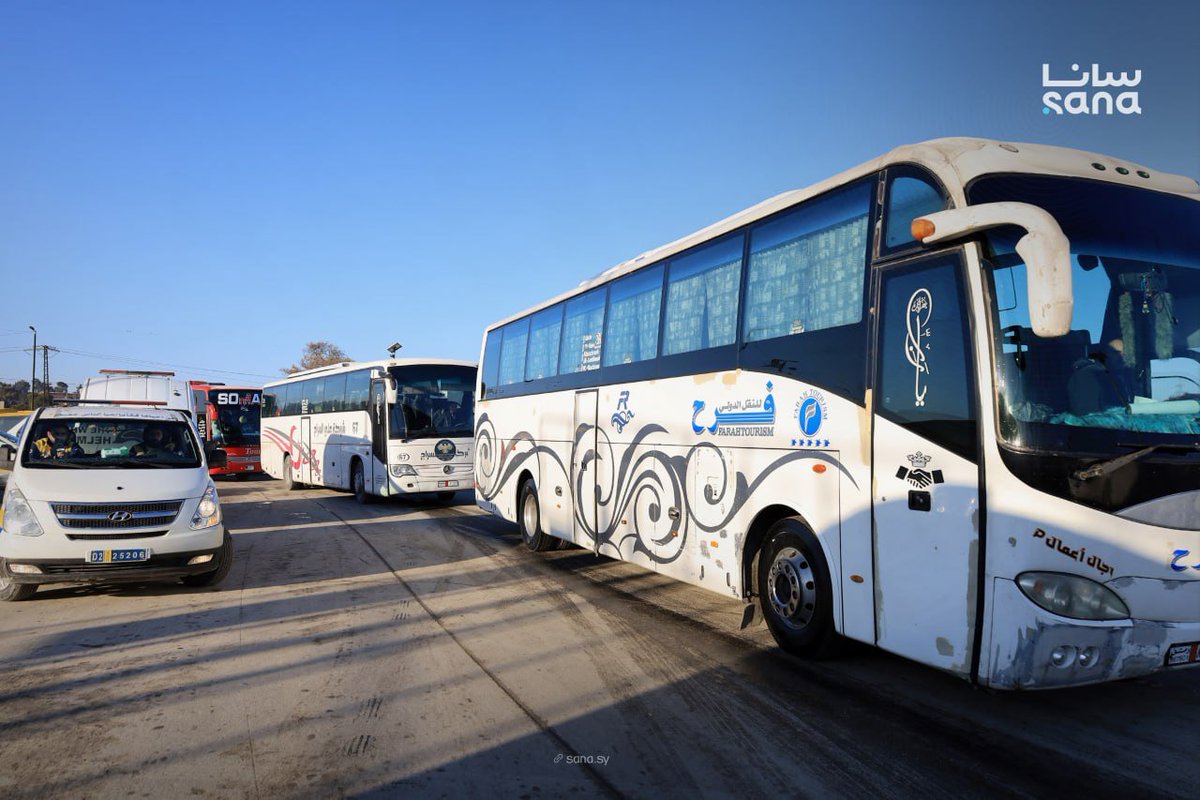A convoy of buses is preparing to depart from Aleppo towards the city of Tabqa, with the aim of transporting displaced residents of Afrin currently residing in Tabqa back to their city.