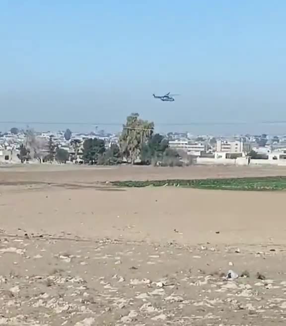 Now that the transfer to Iraq is confirmed, the helicopter activity over Hasakah continues. A Tiger attack helicopter is seen providing escort. This Caracal helicopter, skimming the rooftops—a remarkable feat—is potentially transferring ISIS prisoners from Ghouiran prison in Hasakah.