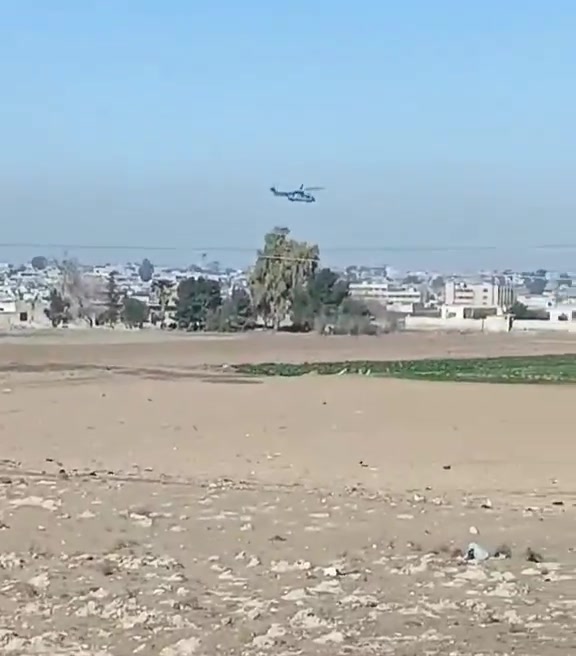 Now that the transfer to Iraq is confirmed, the helicopter activity over Hasakah continues. A Tiger attack helicopter is seen providing escort. This Caracal helicopter, skimming the rooftops—a remarkable feat—is potentially transferring ISIS prisoners from Ghouiran prison in Hasakah.