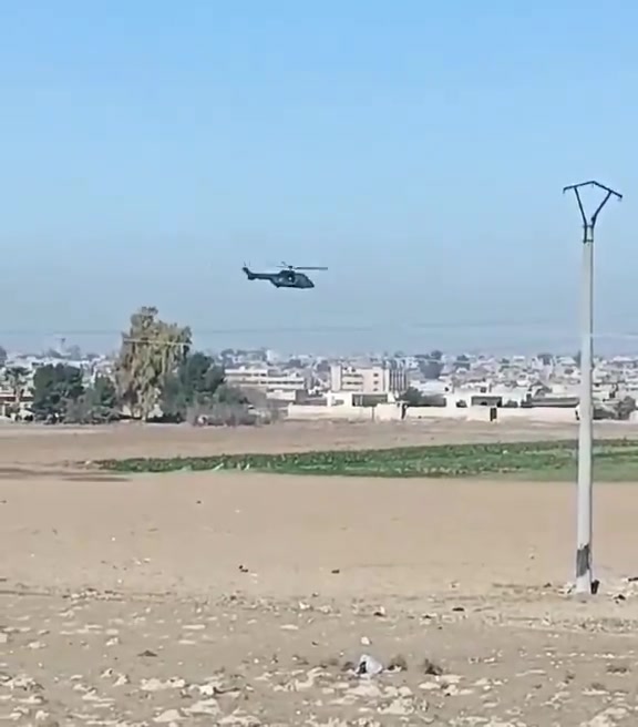 Now that the transfer to Iraq is confirmed, the helicopter activity over Hasakah continues. A Tiger attack helicopter is seen providing escort. This Caracal helicopter, skimming the rooftops—a remarkable feat—is potentially transferring ISIS prisoners from Ghouiran prison in Hasakah.