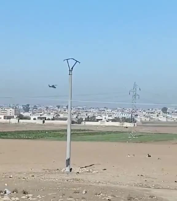 Now that the transfer to Iraq is confirmed, the helicopter activity over Hasakah continues. A Tiger attack helicopter is seen providing escort. This Caracal helicopter, skimming the rooftops—a remarkable feat—is potentially transferring ISIS prisoners from Ghouiran prison in Hasakah.