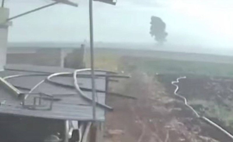 Multiple explosions reported at the Taftanaz military airport in Idlib, Syria, amid rising plumes of smoke from the area, reportedly caused by remnants of the conflict.